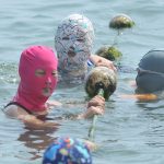 Cina, Il Facekini Diventa Popolare In Spiaggia
