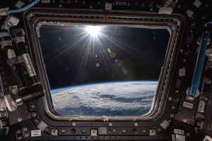 Fotografia della Terra e del Sole visti da una navicella spaziale